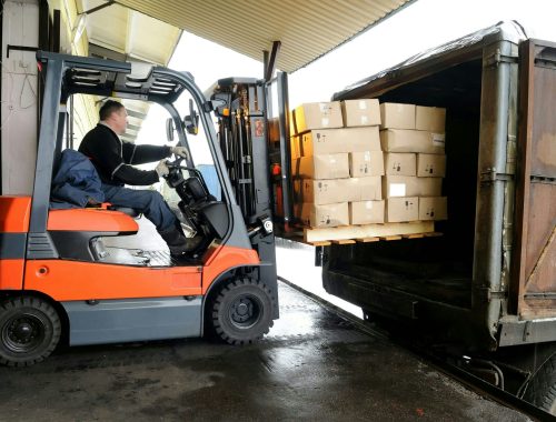 bigstock-Electric-forklift-in-warehouse-18986495